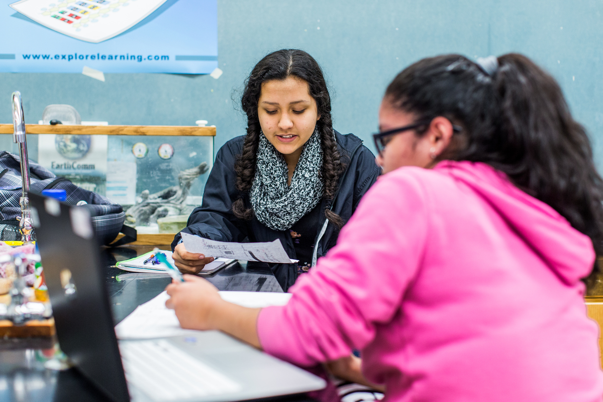 Jacquelinne Lopez, 15, works with other students in a at Global Connections High School in Seattle, WA