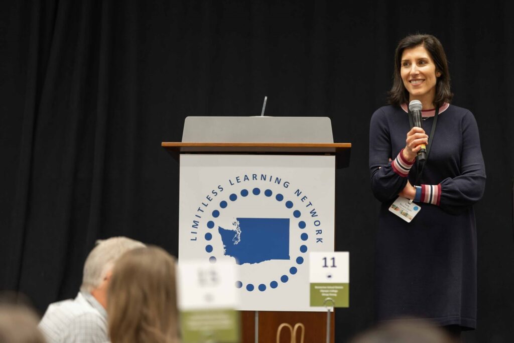 Women presenting with microphone.