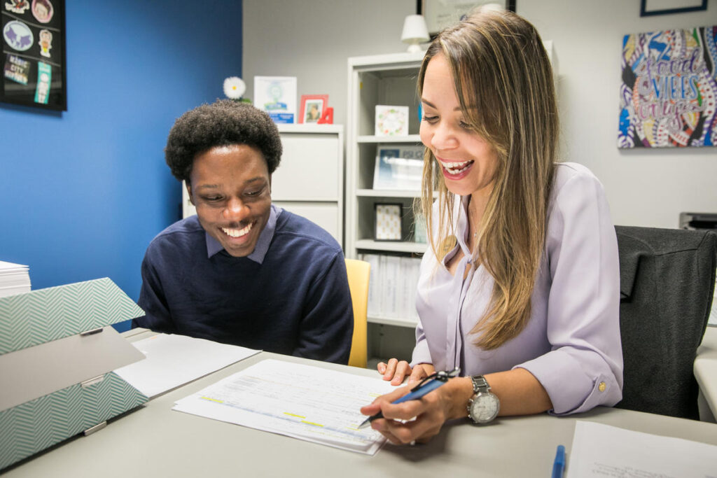 Rudolph Pierre speaks with his advisor Angelica during a meeting at Miami Dade College on campus in Miami, Florida on April 9, 2018.