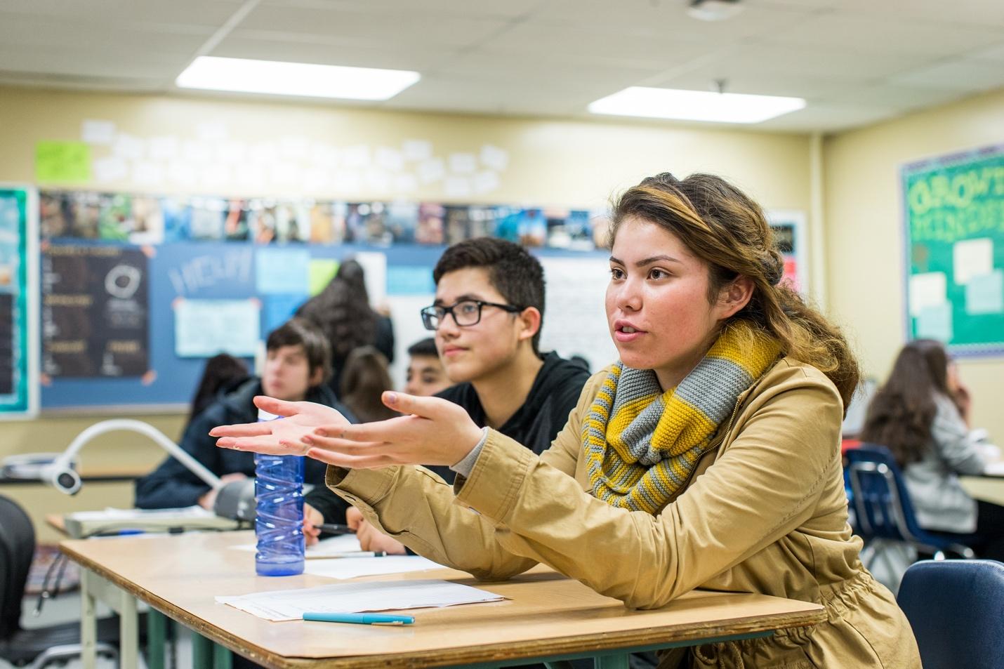 Students engaging in a classroom.