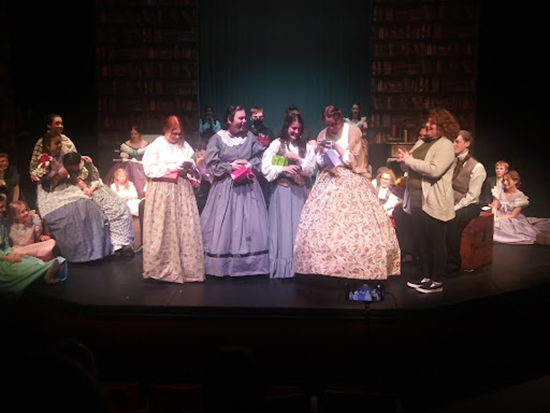 A theatre performance featuring student actors.