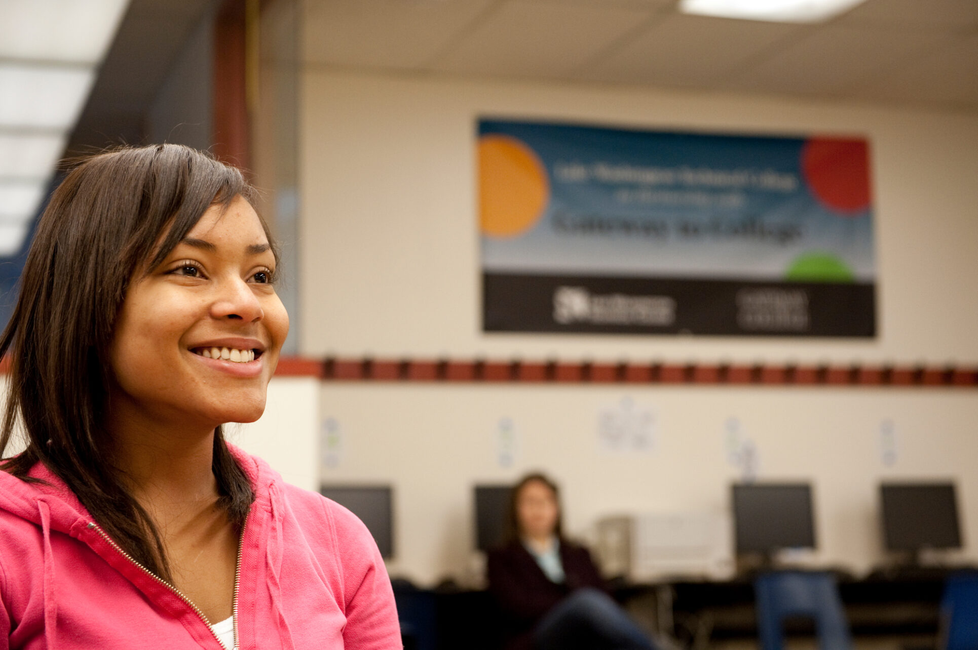 Woman smiling in a classroom