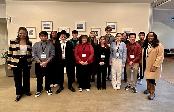 The Education Roundtable members standing as a group together.